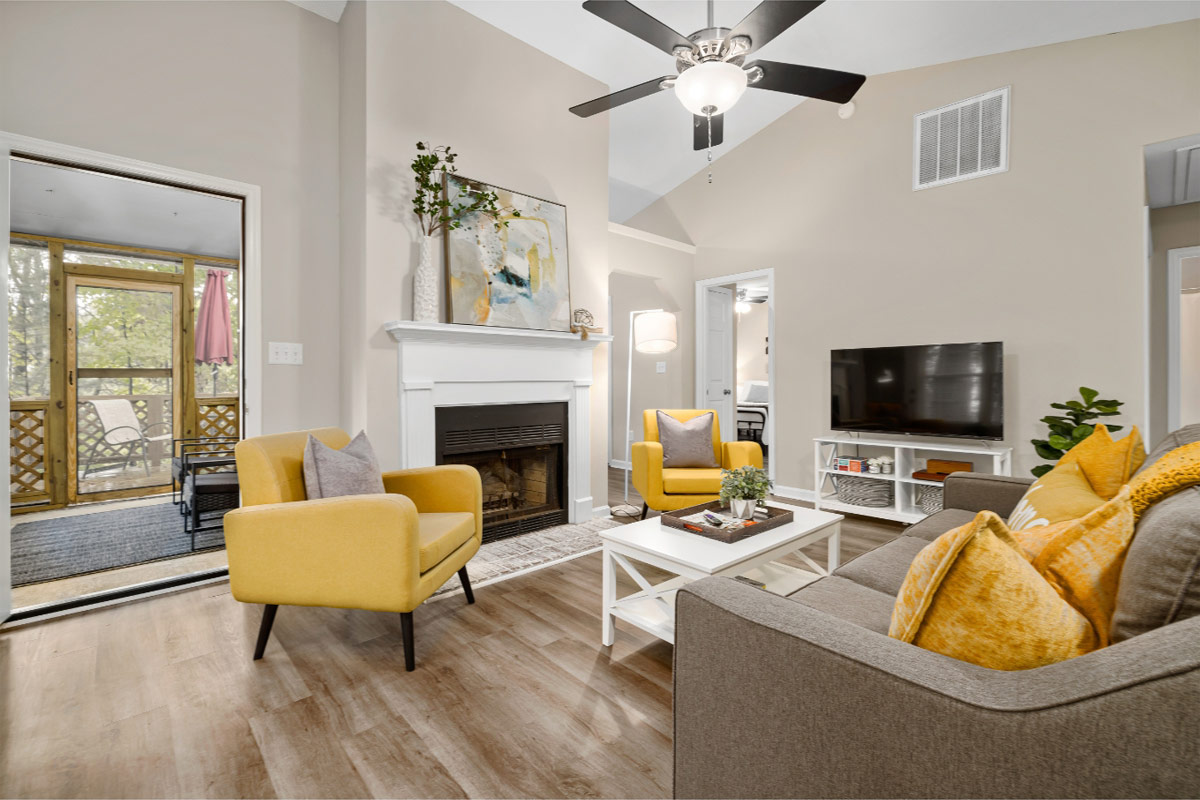 the interior living room of a home that has recently had the walls re-painted